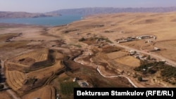 Critics say Uzbekistan should continue to be allowed to use the water, but the reservoir's land should remain within Kyrgyzstan.