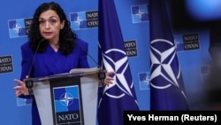 Kosovar President Vjosa Osmani speaks at a press conference at NATO headquarters in Brussels on September 7.