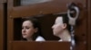 Svetlana Petriichuk (left) and Yevgenia Berkovich in a Moscow courtroom last year. (file photo)