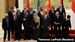 Chinese Foreign Minister Wang Yi hosts a delegation of ministers from Arab and Muslim states in Beijing on November 20. 