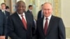 South African President Cyril Ramaphosa (left) meets with Russian President Vladiimir Putin in St. Petersburg on June 17.