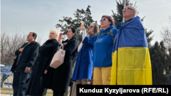 People gathered outside the Russian Embassy in Bishkek as well as other sites in the Kyrgyz capital on February 24 to commemorate the victims of Russian's invasion of Ukraine.