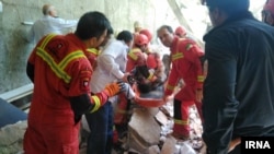 Rescue operations were under way to find others who may be trapped under the rubble.