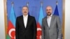 Azerbaijani President Ilham Aliyev poses with European Council President Charles Michel in Brussels on July 14.