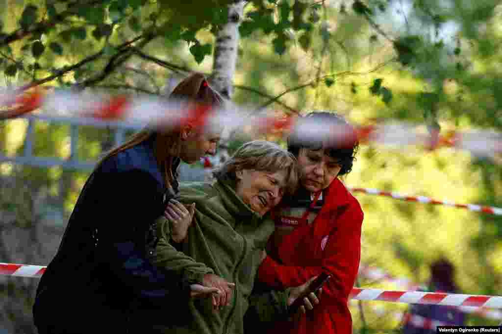 A woman reacts as she looks at the body of her daughter, who was killed during a Russian missile strike in Kyiv on June 1, when many former communist countries celebrate International Children&#39;s Day.