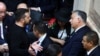 Hungarian Prime Minister Viktor Orban (right) speaks with Ukrainian President Volodymyr Zelenskiy at the swearing-in ceremony of Argentinian President-elect Javier Milei in Buenos Aires on December 10.