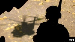 A German soldier on a helicopter patrol in Kunduz