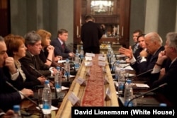 Joe Biden (right) meets with opposition leaders at the U.S. ambassador's residence in Moscow on March 10, 2011.