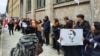 People take part in a rally in support of former Georgian President Mikheil Saakashvili in Munich on January 4. 