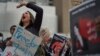 People demonstrate against the Iranian regime during a protest in Toronto in September.