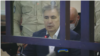 Mikheil Saakashvili appears in a Tbilisi court on April 20. His trial has been postponed.