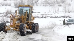 This file photo shows snow being cleared near the Salang Pass in 2008.