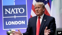 US President Donald Trump speaks at a NATO summit in 2019.