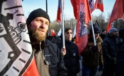 Russian activists advocating what they describe as traditional family values attend a rally against a new domestic-violence law in Moscow in November 2019.