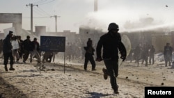 Afghan Koran-Burning Protests Turn Violent