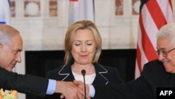 U.S. Secretary of State Hillary Clinton (center), Israeli Prime Minister Binyamin Netanyahu (left), and Palestinian leader Mahmud Abbas during peace talks in Washington, D.C., earlier this month.