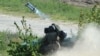 Ukrainian servicemen launch a missile during a test of the U.S. anti-tank missile Javelin systems at an unknown location on May 22, 2018.