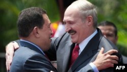 Venezuelan Presidente Hugo Chavez (left) and visiting Belarusian President Alyaksandr Lukashenko in Caracas on March 15.