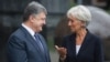 Ukrainian President Petro Poroshenko (left) and Christine Lagarde (right) were all smiles at this meeting in September but the IMF head has since had some very harsh words for the Kyiv administration. 