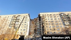 PHOTO GALLERY: Suspected Gas Explosion Devastates High-Rise In Russia's Magnitogorsk (CLICK TO VIEW)