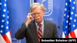 U.S national-security adviser John Bolton gives a press conference with the Israeli prime minister at the latter's office in Jerusalem on August 20.