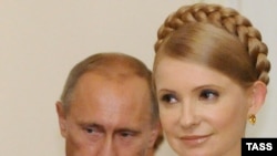 Prime Minister Vladimir Putin meets with his Ukrainian counterpart, Yulia Tymoshenko, in Moscow.