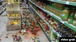 Windows in some buildings were shattered in Samaxi and goods in local shops fell from shelves.