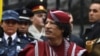 Libyan leader Muammar Qaddafi takes part in an official welcoming ceremony in Kyiv in 2008.