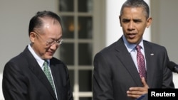 U.S. President Barack Obama (right) said that he believed "nobody is more qualified to carry out that mission" of leading the World Bank than Jim Yong Kim.