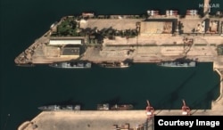 A satellite image shows Russia’s naval vessels departing their usual positions at the Tartus base on December 5. Source: Satellite image ©2024 Maxar Technologies.