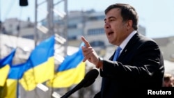 Former Georgian President Mikheil Saakashvili addresses attendees at a Batkivshchyna party during a meeting in central Kyiv in March.