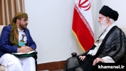 Iranian Supreme Leader Ayatollah Ali Khamenei (right) meets with Huthi movement spokesman, Mohammad Abdul Salam, in Tehran on August 13.