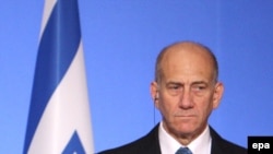 Olmert wants to "find out what Russia is planning to sell," and could try to block the deal.