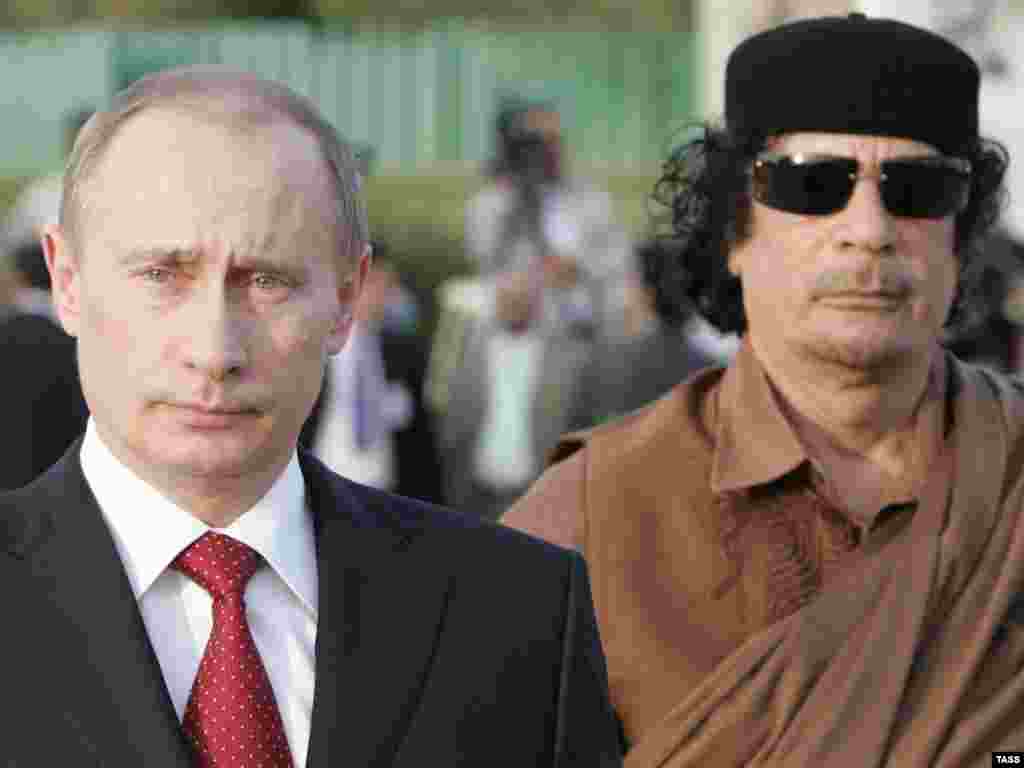 Russian President Vladimir Putin holds talks with Qaddafi at Qaddafi's residence within the Bab al-Aziziya barracks in Tripoli in April 2008.