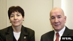 One of the men, Annadurdy Hajiyev, a member of the Watan movement and former deputy chairman of the Central Bank of Turkmenistan, is seen here in a file photo with Tajigul Begmedova, head of the Turkmen Helsinki Foundation on Human Rights