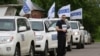 OSCE observers arrive in the village of Zaytseve in the Donetsk region in May.