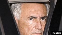 Dominique Strauss-Kahn leaves the New York Police Department in Harlem on May 15.