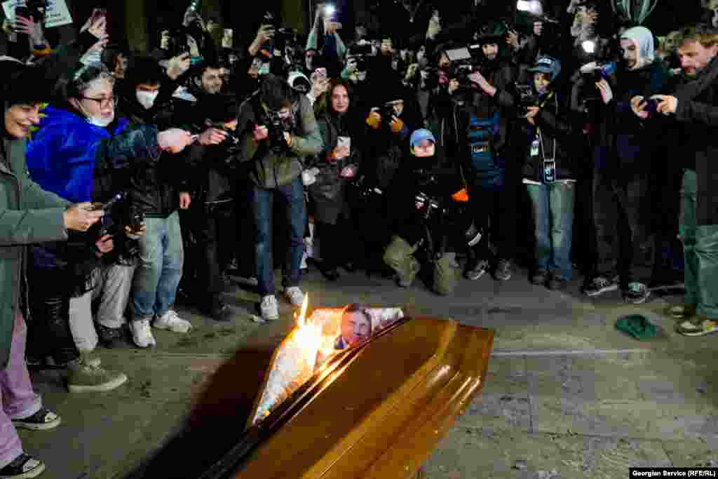 Protesters burn an effigy of Bidzina Ivanishvili on December 9. The billionaire former prime minister is the founder of the ruling Georgian Dream party. Many Georgians expressed their distaste at this symbolic form of protest.&nbsp;&nbsp;