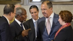 UN-Arab League special envoy Kofi Annan (second from left) speaks with Russian Foreign Minister Sergei Lavrov (second from left), UN Secretary-General Ban Ki-moon (left), and European Union foreign policy chief Catherine Ashton (right) at the start of a c