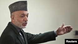 President Hamid Karzai has claimed that UN and EU officials were behind the fraud that marred last August's elections.