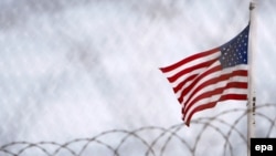 The U.S. flag flies over the detention facilities at Guantanamo Bay.