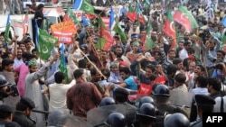 Pakistani protesters clashed with police in the city of Lahore.