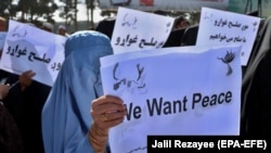 Afghans rally in Herat to support the Doha peace talks between the Taliban and the Afghan government on September 21, 2020.