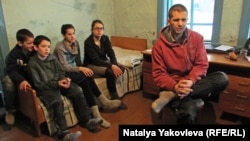 Eugen Martens with some of his 10 children whom he and his wife relocated from "sexually permissive" Germany to a remote village in Siberia, where they intend to "live by the Bible."