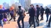 WATCH: Masked Men Attack Women's Day Rally In Bishkek