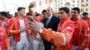 Azerbaijani President Ilham Aliyev poses for a few selfies as he meets with European Games athletes in Baku.