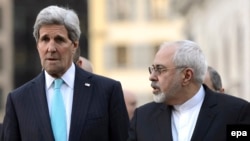 U.S. Secretary of State John Kerry speaks with Iranian Foreign Minister Mohammad Javad Zarif during nuclear talks in Geneva earlier this year.