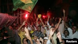 Pakistani soccer fans celebrate a Brazilian World Cup victory over Australia in Karachi in 2006.