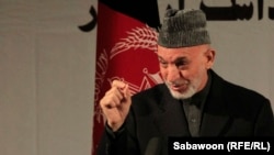 Afghan President Hamid Karzai claims Taliban attacks aid those who argue foreign troops are needed in Afghanistan.