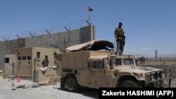 An Afghan Army soldier keeps watch at Bagram Airfield on July 2 after it was vacated by U.S. and NATO troops.